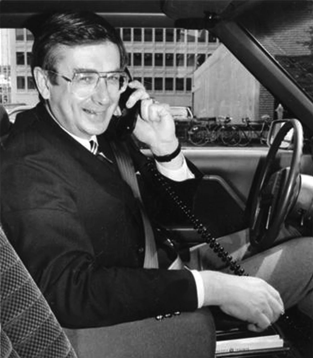 Laurence Decore with a mobile phone in Edmonton.