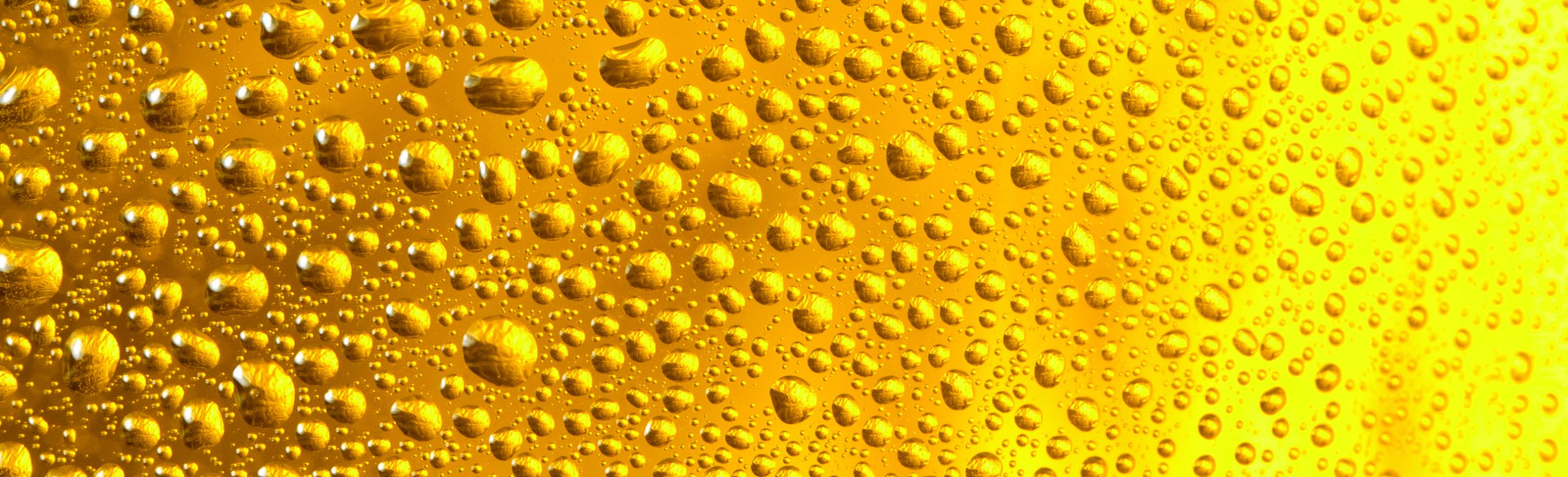 Beer. Light beer with bubbles and foam background. would free trade kill the local beer industry?