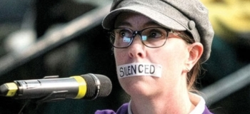 Bonnie Larson with tape across her mouth that reads "Silenced" in protest of the closing of supervised consumption sites